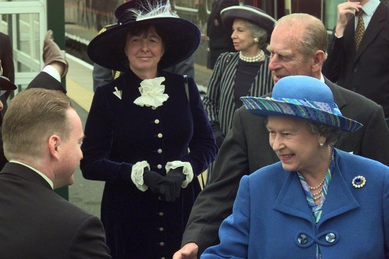 The Queen and Prince Philip are greeted at the unveiling of the Eric Morecambe statue in 1999.
