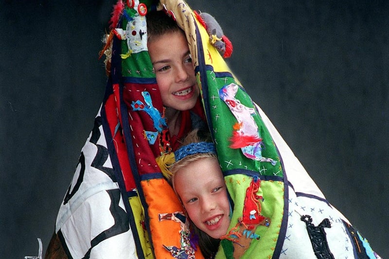 May 1999 and Raynville Primary pupils Daniel Smith and Jessica Hough show-off the school's patchwork blanket.
