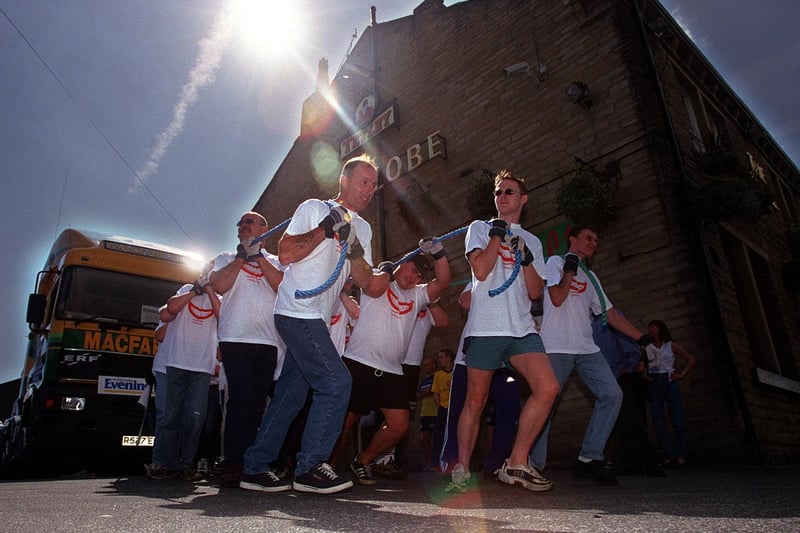 August 1999 and a truck pull makes its way from The Globe pub to raise money for the Victoria Lee Smile Appeal.