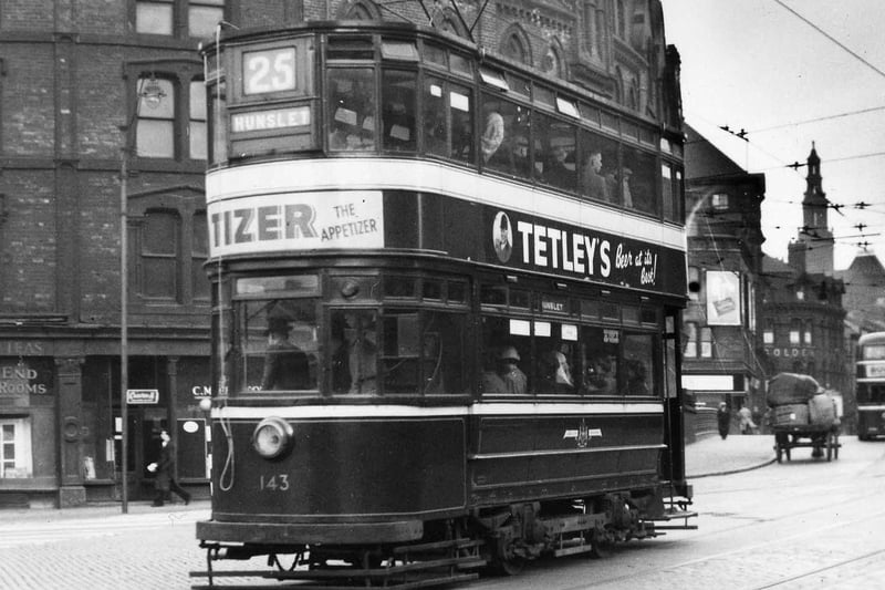 Tram no.143 travelling along Bridge End on route no.25 to Hunslet in July 1952. On the left are the Bridge End Dining Rooms while in the background on the right is the Golden Lion pub at the junction of Lower Briggate and Swinegate.