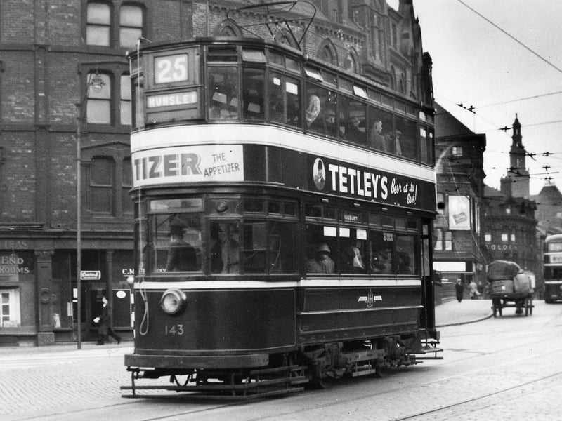 Tram no.143 travelling along Bridge End on route no.25 to Hunslet in July 1952. On the left are the Bridge End Dining Rooms while in the background on the right is the Golden Lion pub at the junction of Lower Briggate and Swinegate.
