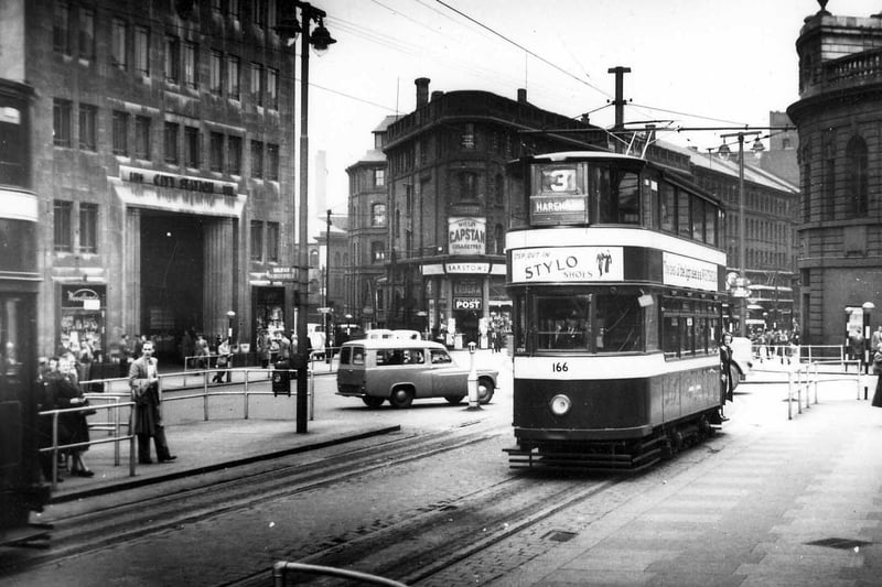 Tram no.166 on route 3 to Harehills, passing through City Square with Wellington Street in the background in July 1952.