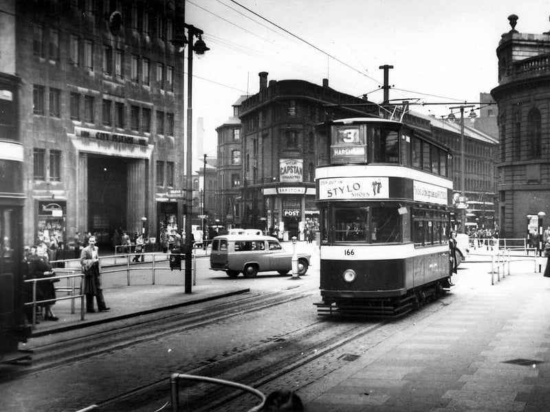 Tram no.166 on route 3 to Harehills, passing through City Square with Wellington Street in the background in July 1952.