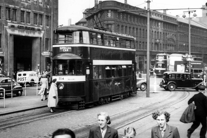 July 1952. City Square showing tram no.554, one of the Feltham trams which came to Leeds from London in 1950. The entrance to the City Station is on the left, the Majestic cinema just visible on the right.
