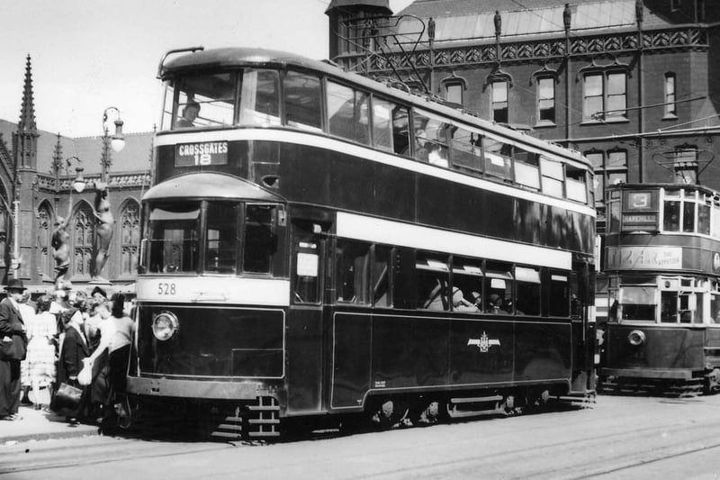Two trams on City Square in July 1951. In the front is no.528, on route 18 to Crossgates, a Feltham tram which was acquired from London in 1950. Behind is a Chamberlain tram, no.148, on route 3 to Harehills.