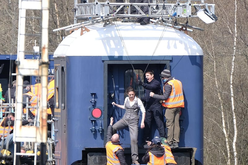 Hayley Atwell climbs down from the carriage