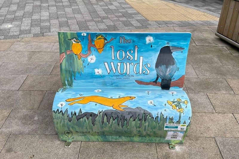 This bench by pupils from Coppull Parish CE Primary School is Number One in the Book Bench trail. It can be found outside Booths
