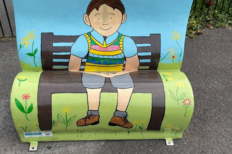 The book character Silly Billy takes a seat on his own bench in this artwork created by Mawdesley St Peter’s CE Primary School. Find it by Eden of Chorley in the Book Bench Trail.