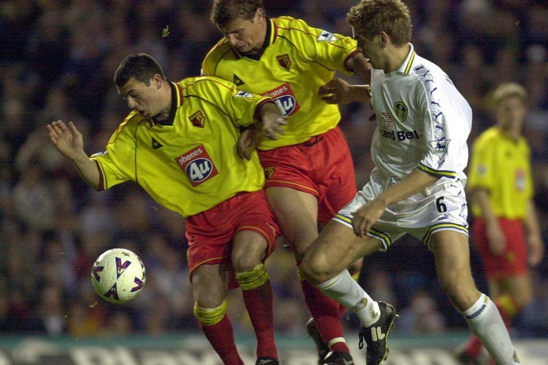 Jonathan Woodgate finds himself blocked by Watford defenders Paul Robinson and Robert Page.