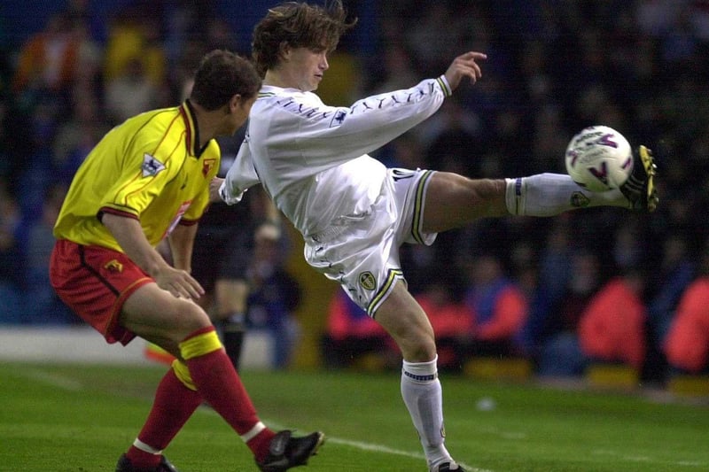 Harry Kewell protects the ball from Watford's Neil Cox.