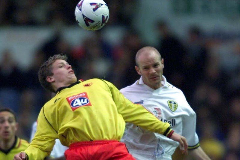 Danny Mills wins an aerial duel.