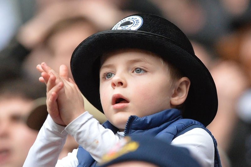 A very young PNE fan dons his Gentry bowler at Boiton