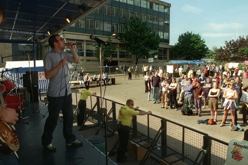 New Souls' front man, Steve Cooper, sings to the crowd at the city centre's Gay Weekend in May 1998.