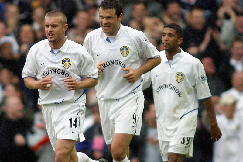 Mark Viduka celebrates after making sure of the three points when he rounded Villa goalkeeper Stefan Postma and slotted home.