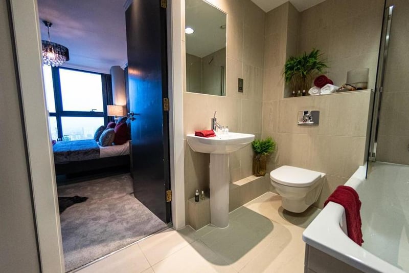 The first bedrooms spacious bathroom fits a shower, bath, toilet and two sinks which is perfect for a couple.
