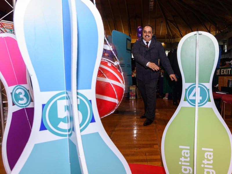 Mizan Muhammed from Nybble tries out a bowling game at Stonecreate at Lancashire Business Expo at Preston's Guild Hall