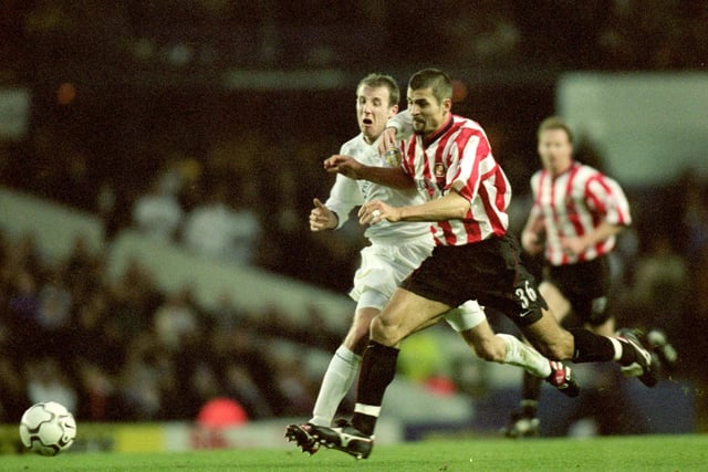 Lee Bowyer is muscled off the ball by Sunderland's Emerson Thome.