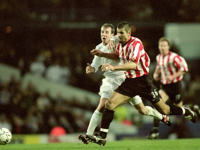 Lee Bowyer is muscled off the ball by Sunderland's Emerson Thome.