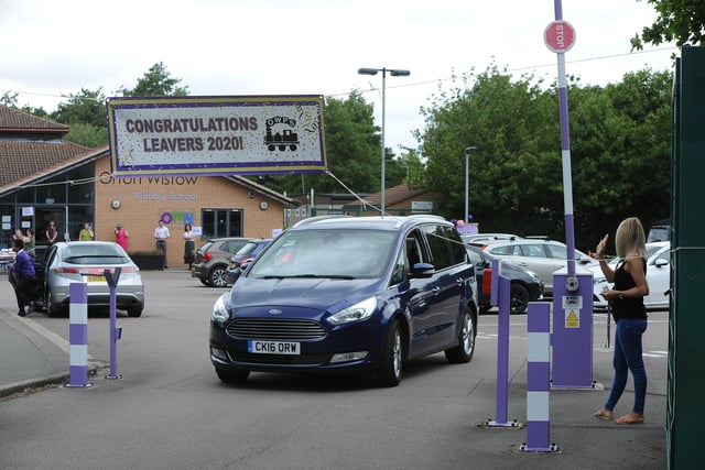Year 6 leavers celebration drive through event at Orton Wistow primary school. EMN-200714-092909009