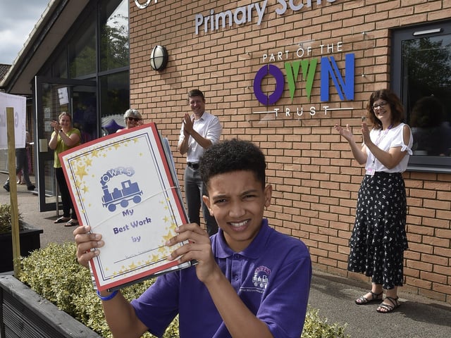 Year 6 leavers celebration drive through event at Orton Wistow primary school. EMN-200714-092722009