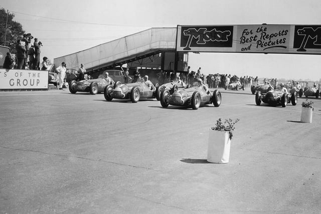 Note the flowerpots on the start line for the Grand Prix de'Europe  or The Royal Automobile Club Grand Prix d'Europe Incorporating The British Grand Prix to give its full title  won by Italian Giuseppe Farina, at Silverstone in 1950.