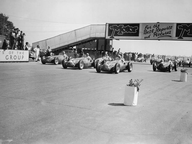 Note the flowerpots on the start line for the Grand Prix de'Europe or The Royal Automobile Club Grand Prix d'Europe Incorporating The British Grand Prix to give its full title won by Italian Giuseppe Farina, at Silverstone in 1950.