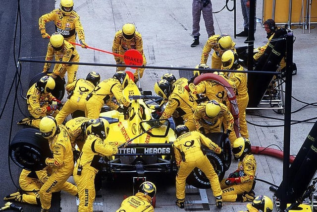 Pit stops became as important in F1 as driving round the track. This is the Jordan Honda crew changing tyres and refuelling for Heinz-Harald Frentzen in 2001. Mika Hakkinen won in a McLaren from two Ferraris driven by Michael Schumacher and Rubens Barrichello.