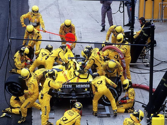 Pit stops became as important in F1 as driving round the track. This is the Jordan Honda crew changing tyres and refuelling for Heinz-Harald Frentzen in 2001. Mika Hakkinen won in a McLaren from two Ferraris driven by Michael Schumacher and Rubens Barrichello.