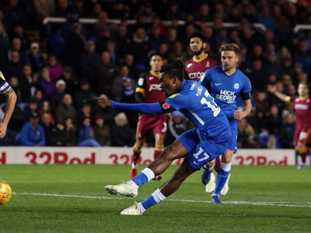 Bradford City (a), 2018.
Ivan Toney’s hat-trick of goals and Conor O’Malley’s hat-trick of penalty shootout saves after a 4-4 draw at Valley Parade. Posh had thrown away a 2-0 lead in the first tie at London Road, but emerged victorious on penalties after a topsy-turvey replay thriller. Toney's opening goal from close to the halfway line was a sign of the greatness to come. He's pictured completing his hat-trick.