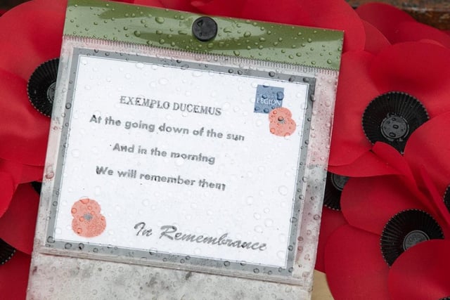 One of the wreaths laid at the war memorial at St Peter's Church, Selsey. Photo: Chris Hatton