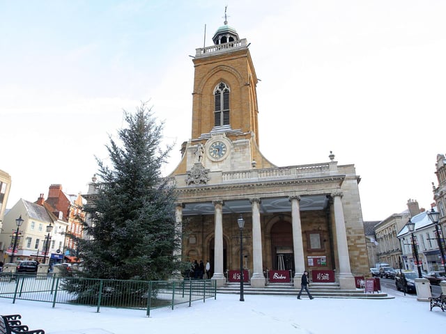 The Christmas tree outside All Saints Church looked even more festive surrounded by snow