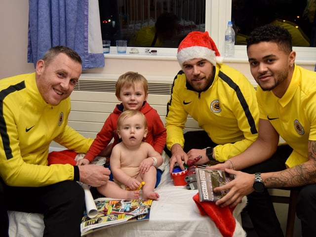 Delivering gifts to the Pilgrim Hospital Children's Ward.