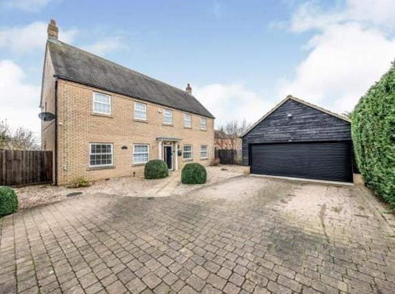 This 5 bed detached house in Longmeadow Drive, Wilstead, is on the market for £850,000 (Zoopla/Wilson Peacock - Bedford Sales)