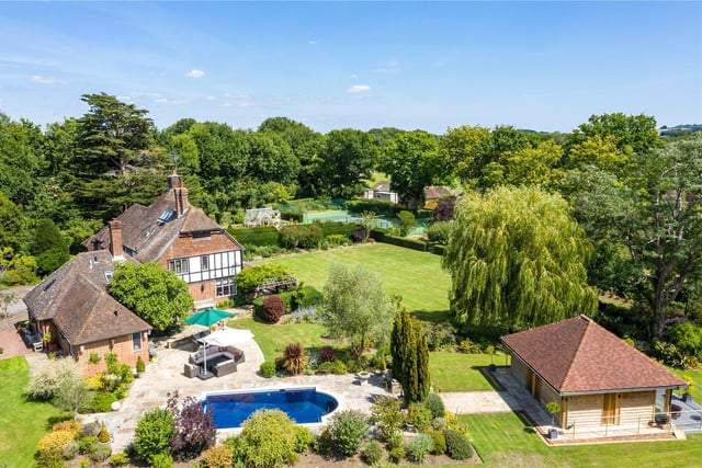 A beautifully presented country house, set in around 17 acres of grounds and paddocks, with formal gardens, equestrian facilities and self-contained annexe. Price: £3,750,000.
