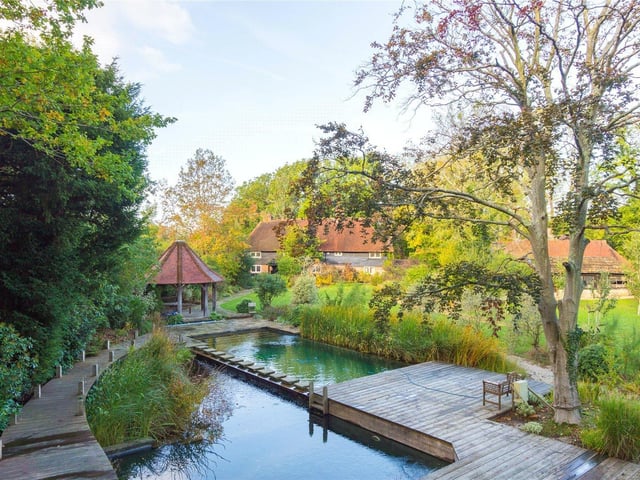 Historic Grade II listed rural retreat with unique landscaped wild swimming pool. Price: Offers over £1,500,000.