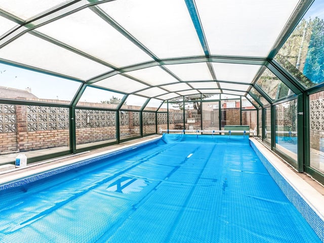 A large four bedroom family home with annee and super views from roof terrace. Price: £800,000.