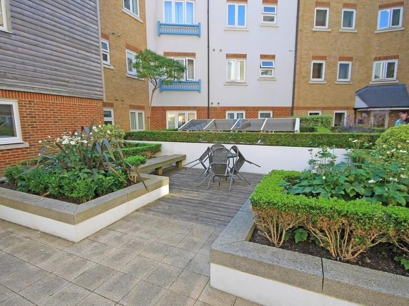 A secure two bedroom top floor balcony apartment in Marline Court in the popular Ropetackle development in central Shoreham-by-Sea offering gated underground parking with river and downland views.