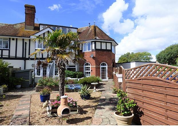 A ground floor, two bedroom apartment within 100 yards of the private beach. There is vacant possession and no onward chain.
