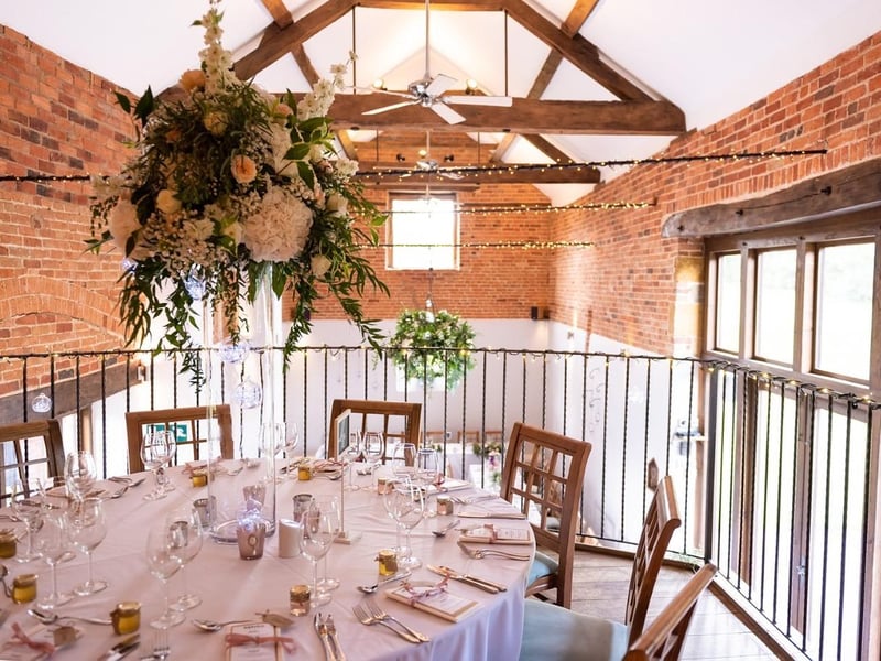 Dodmoor House is a family-run wedding venue in Northampton that offers exclusive use of its Grade II listed barns for weddings, civil ceremonies and receptions. They can cater for up to 90 guests for a civil ceremony in the Courtyard Barn and a seated wedding breakfast in the Catesby Barn and have the capacity for 180 guests for the evening celebrations.