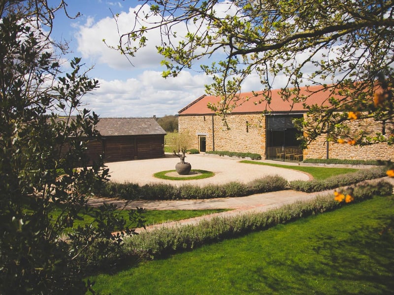 Dodford Manor is perfect for couples who would like to have a rustic wedding. They are a family-run business that offers exclusive use of their Grade II listed restored barn wedding venue set in 20 acres of rolling Northamptonshire countryside.