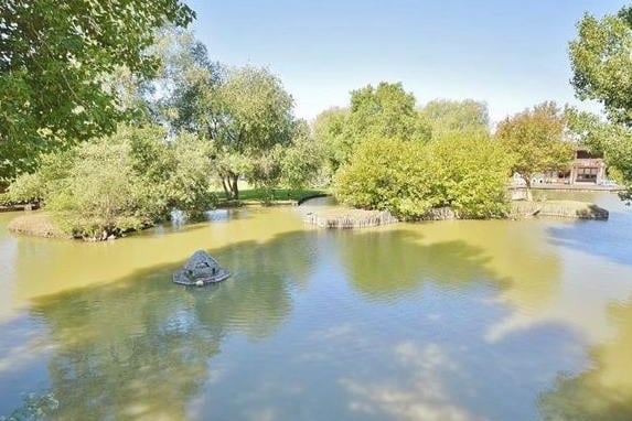 A quite unique lakeside property set in approaching 10 acres with views across the Chilterns countryside.