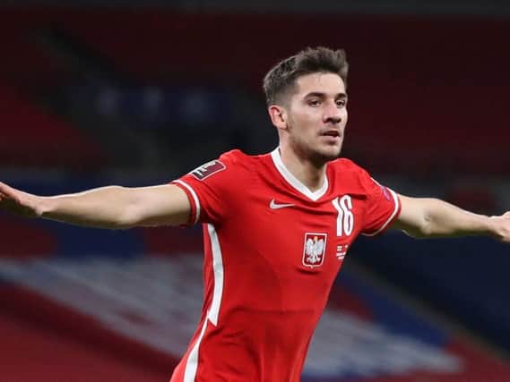 Brighton's Poland international Jakub Moder celebrates his strike against England at Wembley on Wednesday night