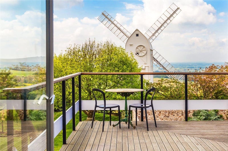 The Mill House's roof terrace with a view of Jill Windmill