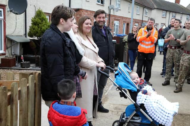 Lindsey McAuley with her family and Nick Knowles