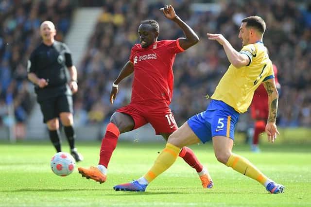 Liverpool recorded a 2-0 victory against Brighton at the Amex Stadium yesterday to keep up the pressure on Manchester City in the Premier league title race