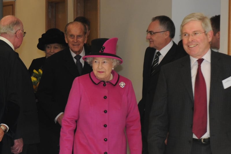 Walking behind the Queen, Prince Philip on his visit to the Warwickshire Justice Centre in Leamington in 2011. Photo by Morris Troughton.