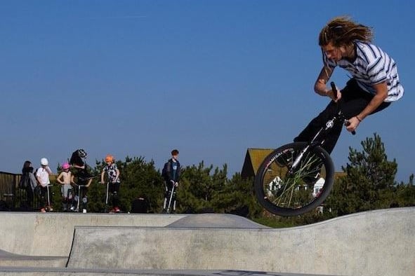 Youngsters out on their BMXs at Eastbourne Skatepark on a sunny Saturday afternoon. This photograph was taken by David Reynolds using an iPad. SUS-210414-102006001