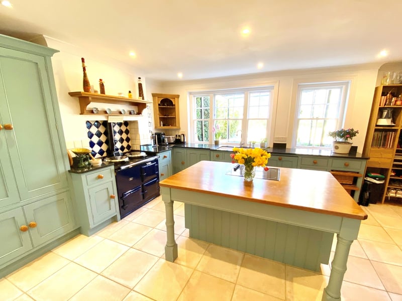 A central island unit and AGA feature in the kitchen-breakfast room. The house also has a wine cellar