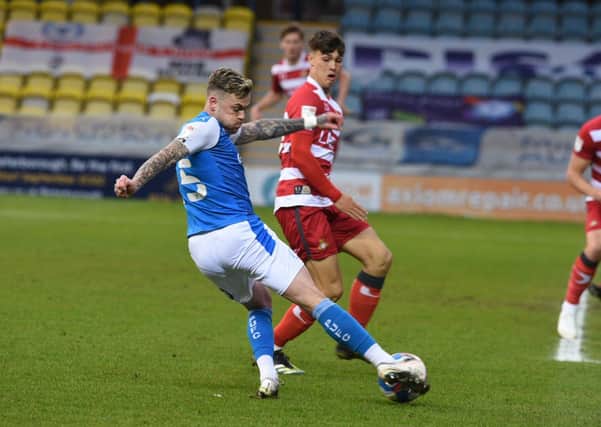 Sammie Szmodics in action for Posh against Doncaster.