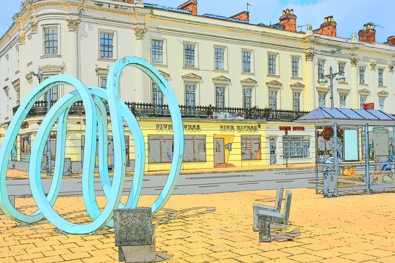 The ‘Spring’ water sculpture and Victoria Terrace on July 26 2020 by Allan Jennings. The artist for the £30,000 water sculpture was Oliver Barratt. It celebrates the origins of this Warwickshire Spa town. The steel structure took three months to produce. It was unveiled in March 2008 by council dignitaries and the Bishop of Warwick, the Right Reverend John Stroyan. Victoria Terrace dates to 1836.